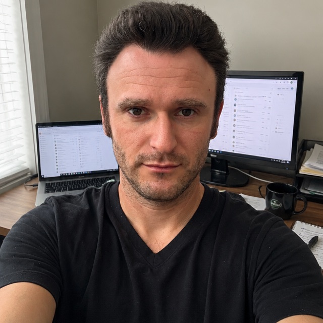 Daniel Slovak, founder of EazyAgent AI, at his desk
